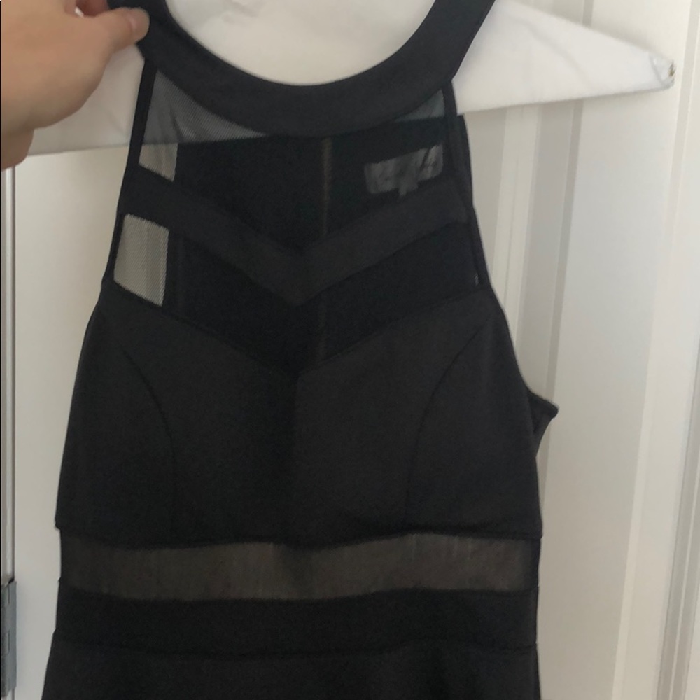 Black flare out dress with gold back zipper